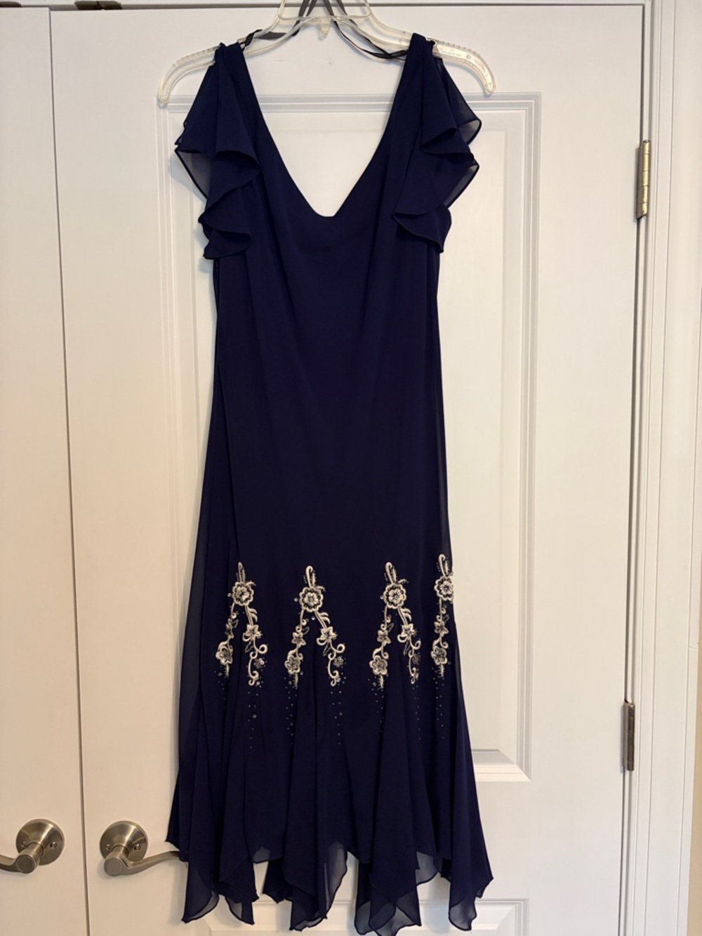 Navy Ruffle Sleeve Dress with Embroidered Hem